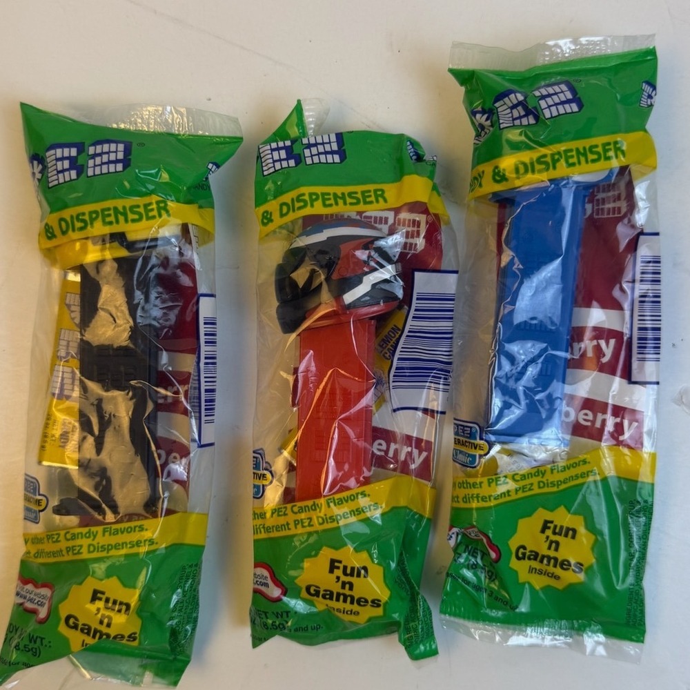 Lot of 3 Vintage PEZ Candy Dispensers New Sealed Racing Helmet Blue Black